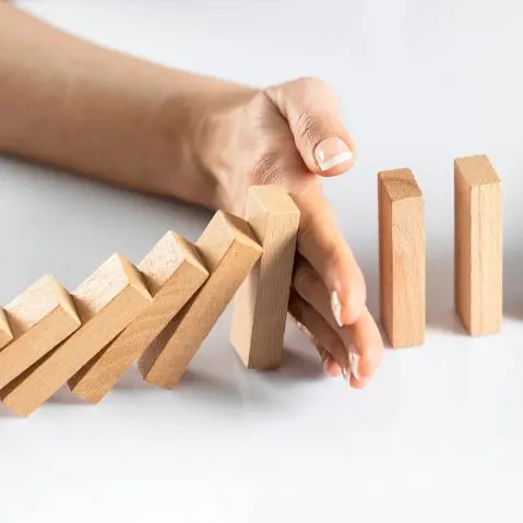 stoppen dominosteentjes